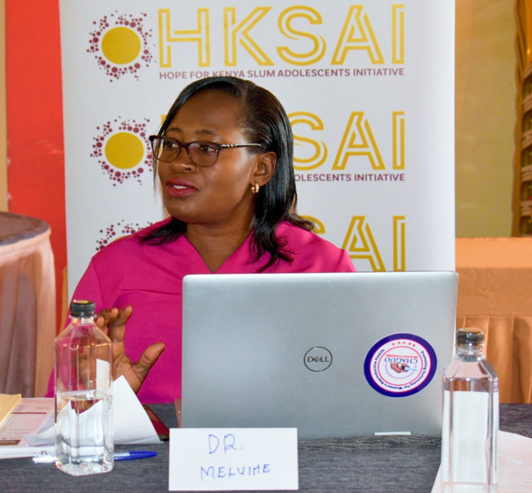 ABOUT THE FOUNDER - Melvine Praxides Ouyo (MPA, MPH, BScN).